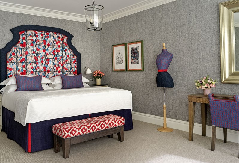 The bedroom of a Luxury Junior Suite at Ham Yard Hotel