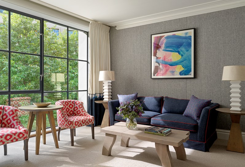 A seating area of a Luxury Junior Suite at Ham Yard Hotel