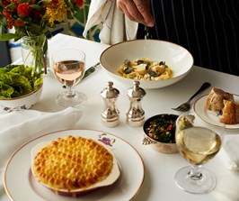 A table for two in Brumus at Haymarket Hotel with dishes including squash tortellini with sage and smoked ricotta and Brumus smoked haddock, salmon and native lobster fish pie