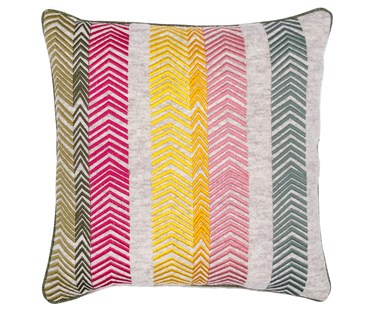 Kit's signature "Bookend" embroidery forms diagonal chevrons (embroidered) panels ranging in colours from green to pink and yellow, on a oatmeal wool base, to create this stand out large ( 50x50cm ) cushion, with plain wool back.