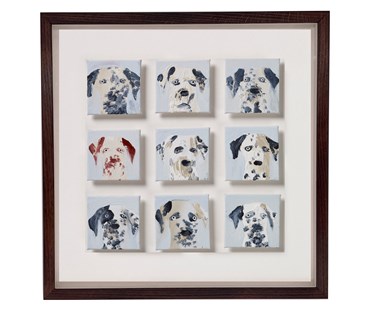 Close up of Holly Frean's 9 Dalmatians : a framed painting consisting of 9 individual portraits of Dalmatians, all but one of which are black and white, with one brown and white one, all of whom are featured against a pale blue background. These Portraits re float mounted on white conservation board, and the piece is framed in a dark brown wooden frame.