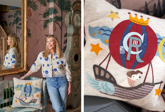 A portrait of Kit Kemp with a limited-edition Coronation cushion