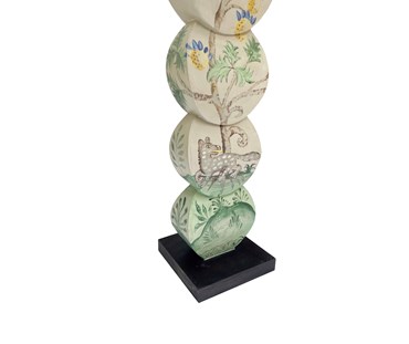 Detailed shot of the Hedgerow Quince leopard lamp, is hand painted by Melissa White, and features a grey leopard, under a fruit laden tree, in muted shades of greys, greens, blues and yellow , to create these wonderfully playful and unique lamp.