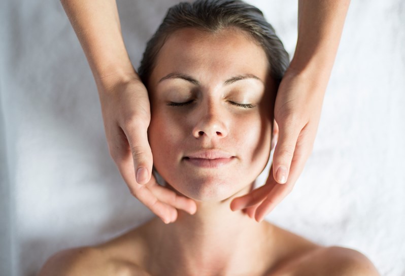 A woman enjoys a spa treatment
