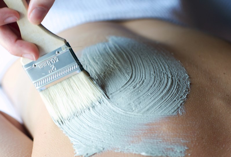 A spa body treatment being applied