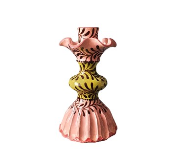 A small candlestick in soft pinks, and lime , is hand painted with chocolate garlands, with its striped detailed base, is a great piece whether standing alone or combined with it's taller partners.
Size: H: 18cm Diameter: Base: 10cm
Material: Glazed Earthenware.