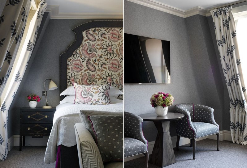 A grey schemed split photo with the left side showing half of a bed next to a window on the sloping ceiling. The right shows the same curtains with 2 armchairs and a table under a TV.