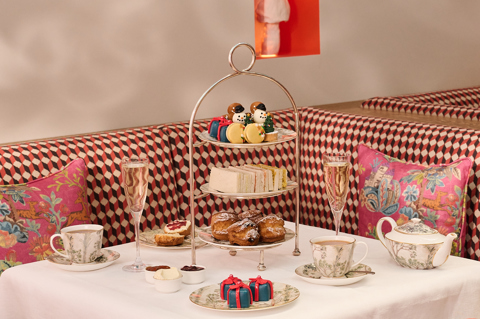 A festive afternoon tea set up on a table in The Orangery at Warren Street Hotel