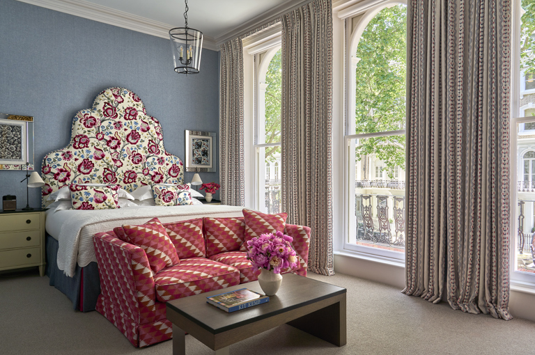 Bedroom shot of room 102, a Junior Suite at Knightsbridge Hotel