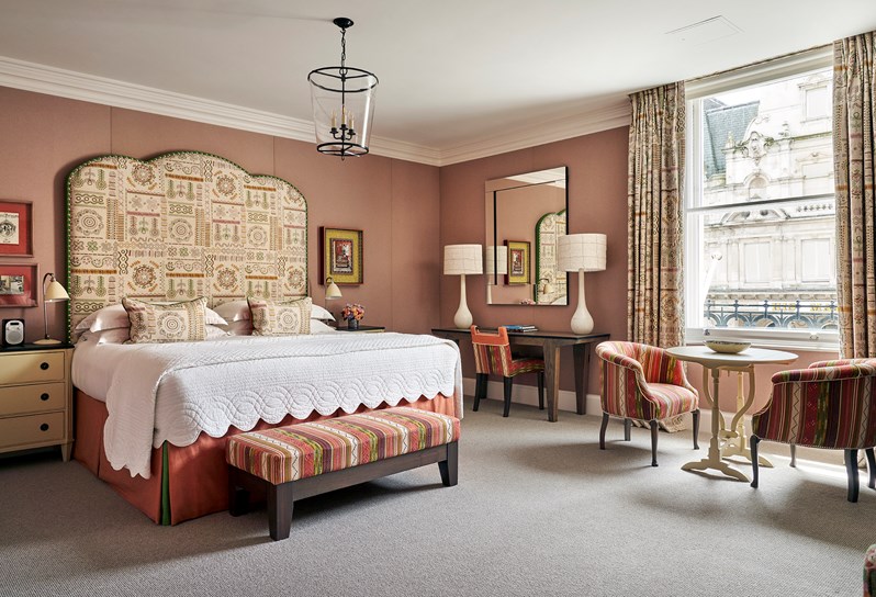 A bedroom shot of the luxury junior suite at Haymarket hotel
