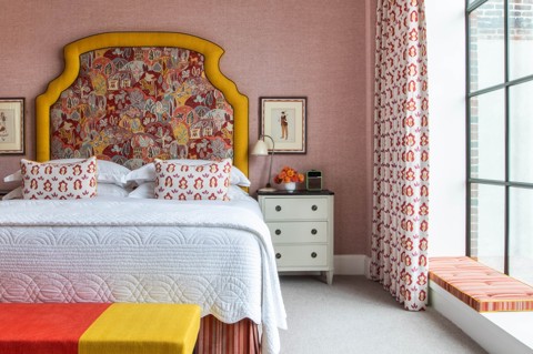 A straight on shot of the bed in room 809, a Luxury One Bedroom Suite at Crosby Street Hotel