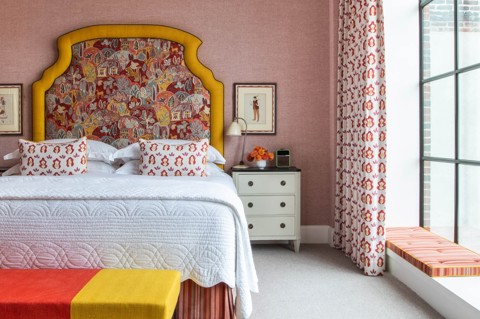 A straight on shot of the bed in room 809, a Luxury One Bedroom Suite at Crosby Street Hotel