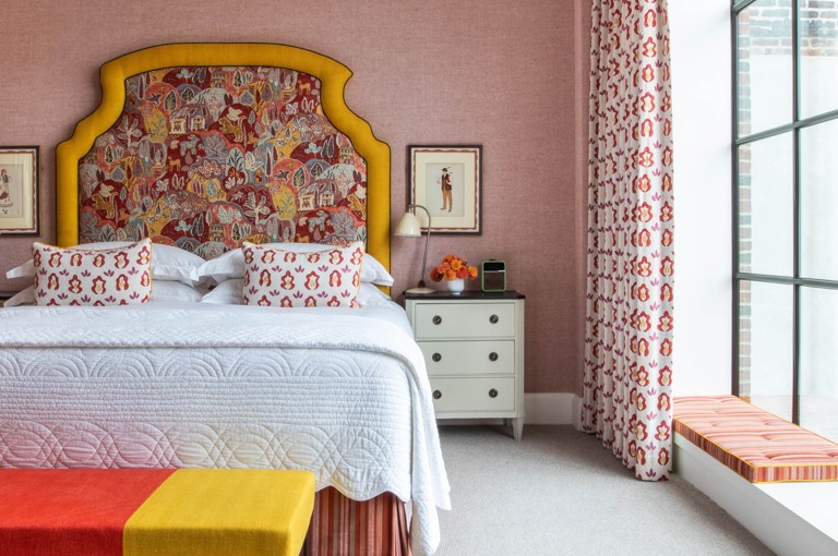 A straight on shot of the bed in room 809, a Luxury One Bedroom Suite at Crosby Street Hotel