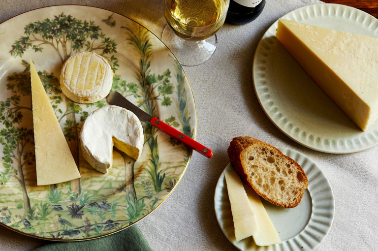 Cheese Dinners at The Potting Shed. Plates of cheese on a table
