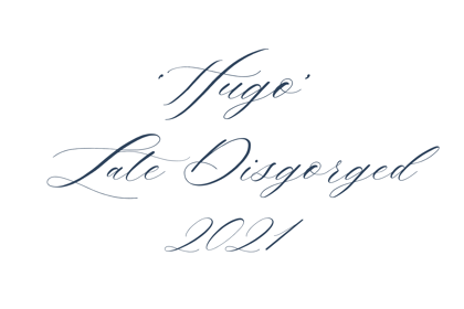 Handwritten script saying "Hugo Late Disgorged 2021"