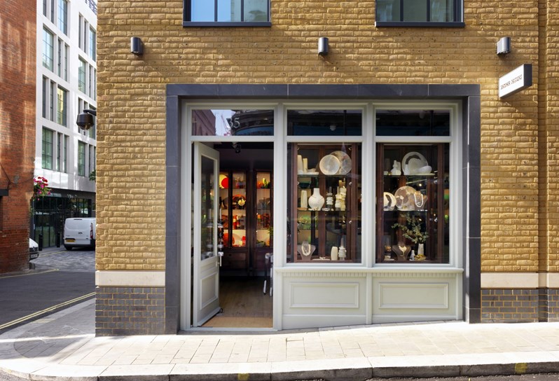 The exterior of Dinosaur Designs shop in Ham Yard Village.