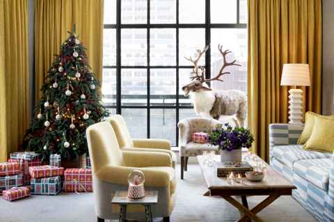 Wide shot of a Christmas tree in a suite at The Whitby Hotel