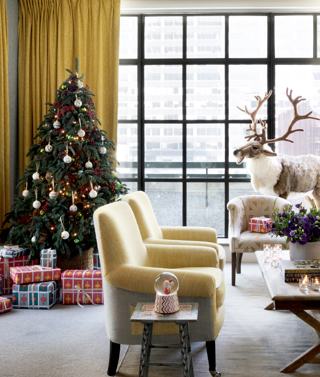 Wide shot of a Christmas tree in a suite at The Whitby Hotel