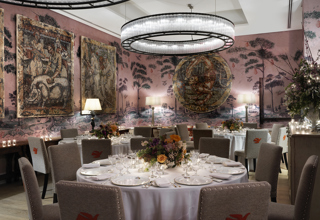Round dining tables set-up in the Anrep private events room at The Whitby Hotel