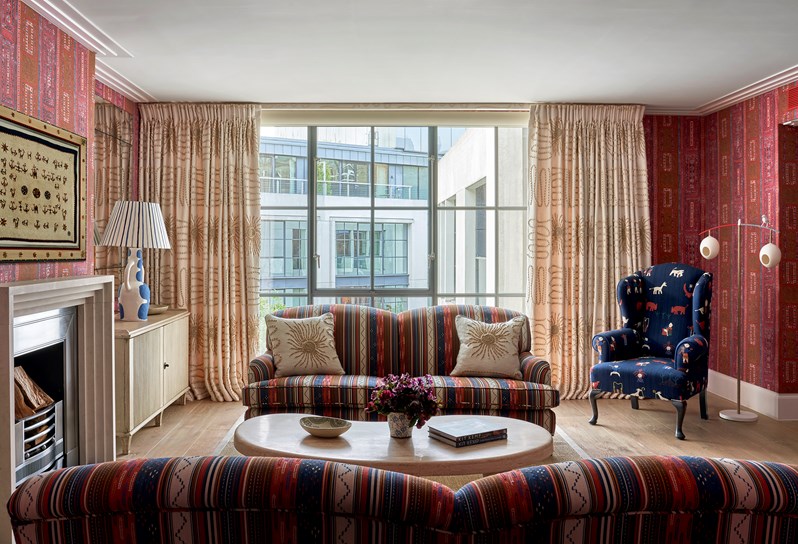 An image of the sitting room in Deluxe Two Bedroom residence, Residence 16, at Ham Yard Hotel.