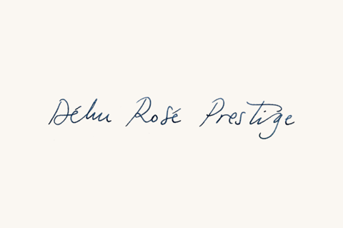 Handwritten script saying Dehu Rose Prestige