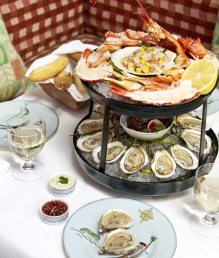 Sailor's Farewell Seafood Bar at The Whitby Bar. Closed up shot of a two-tiered seafood tower from above