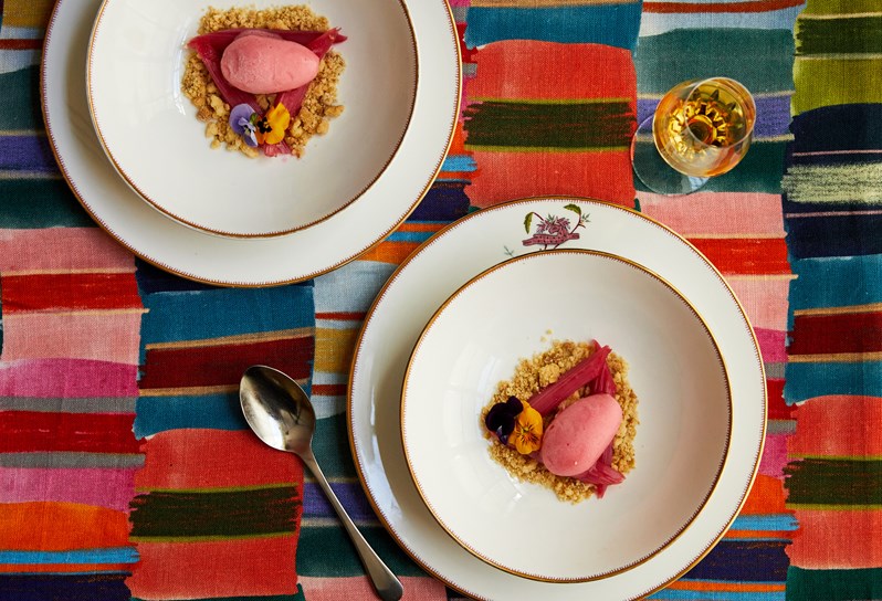An image of a dessert with rhubarb and sorbet at Refuel, Soho hotel.