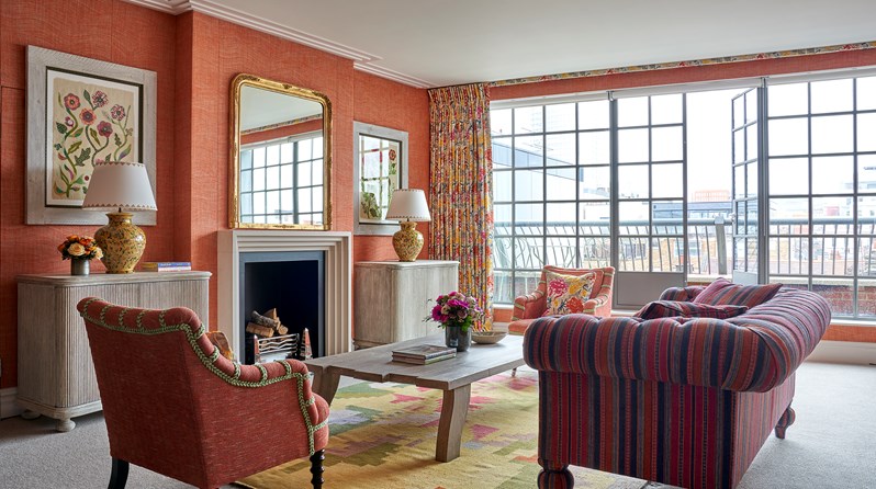 The living room area of the Soho Suite at The Soho Hotel