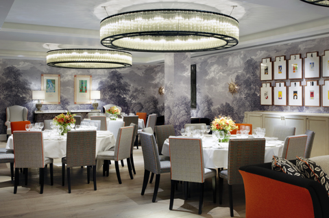 Round dining tables set-up in the Windmill private events room at Ham Yard Hotel