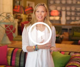 Firmdale Hotel Creative Director Kit Kemp in the Drawing Room at Soho Hotel. Overlaid on the image is a play button icon.
