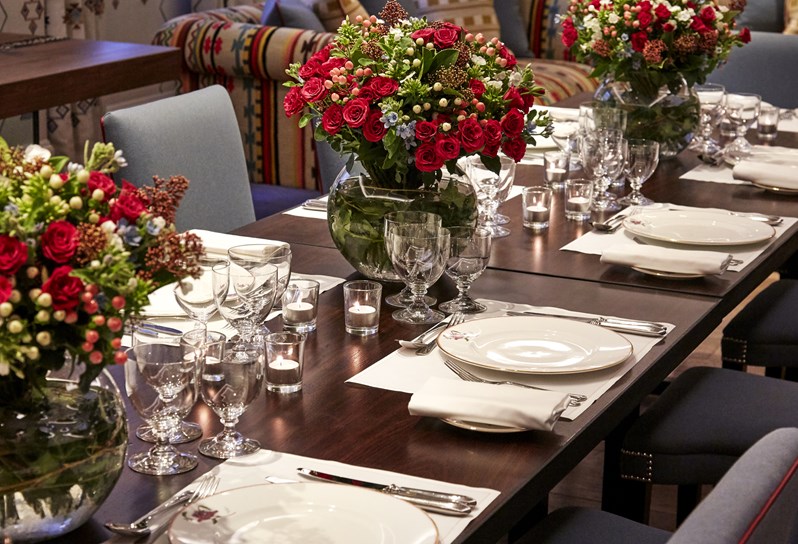 A close up view of the table setting for an intimate dinner in Rocklin room.
