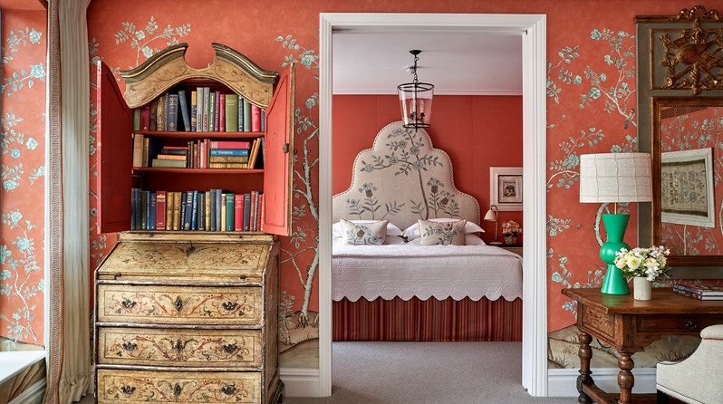 The doorway between the bedroom and living room that shows the bed in the One Bedroom Richmond Suite Rm217