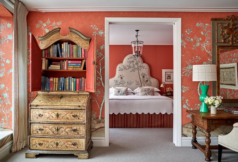 The doorway between the bedroom and living room that shows the bed in the One Bedroom Richmond Suite Rm217
