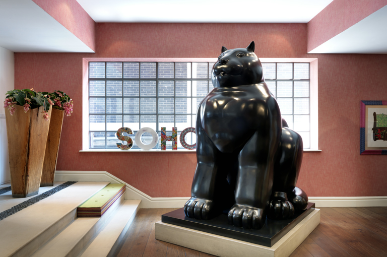 Close shot of the Botero Cat Sculpture in the lobby at The Soho Hotel