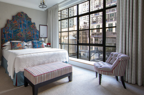 Diagonal shot of the bedroom in room 1107, One Bedroom Suite at The Whitby Hotel