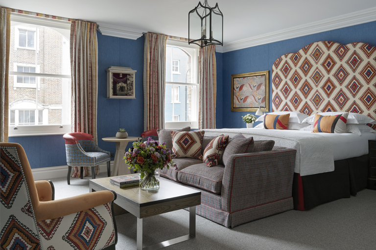 Bedroom shot of room 100, a Deluxe Junior Suite at Charlotte Street Hotel