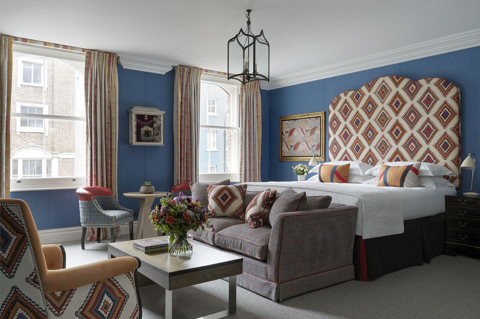 Bedroom shot of room 100, a Deluxe Junior Suite at Charlotte Street Hotel