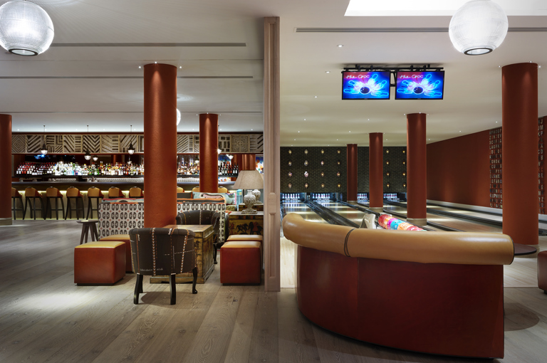 Wide shot of the Croc Bowling Alley and Bar at Ham Yard Hotel