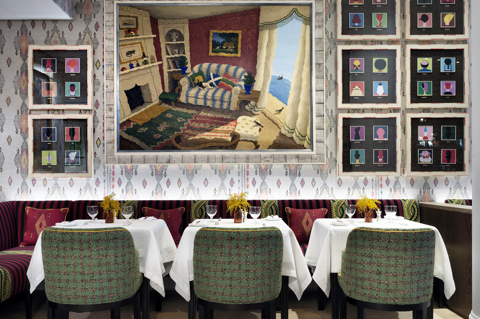 Close shot of dining tables against the wall of the Restaurant at The Whitby Hotel