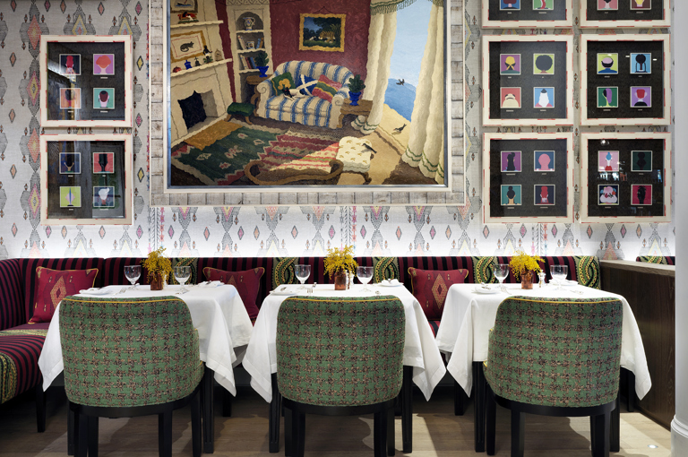 Close shot of dining tables against the wall of the Restaurant at The Whitby Hotel