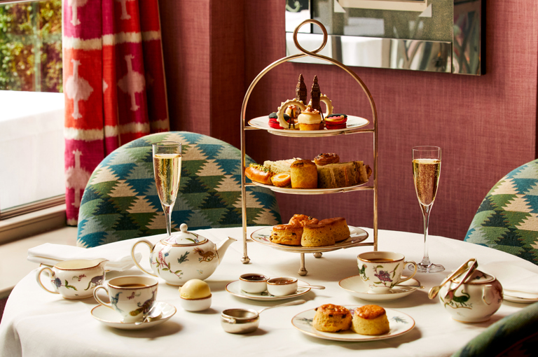 London Calling Afternoon Tea at Haymarket Hotel on a table with Champagne