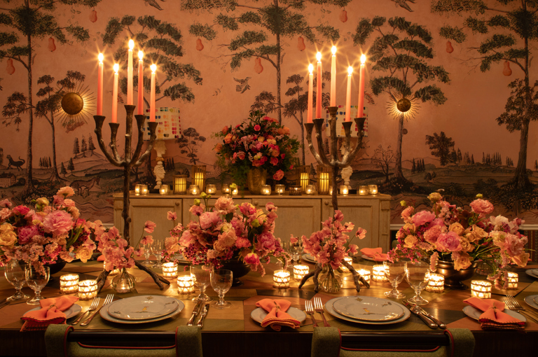 Close shot of an evening dining table set-up at candlelight in the Araminta private events room at the Whitby Hotel