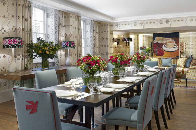 Day shot of a long dining table in the Rocklin private events room at Haymarket Hotel