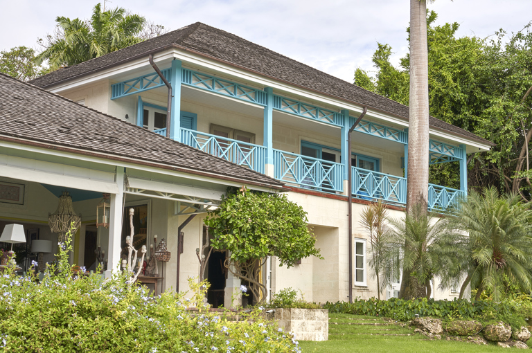 An image of the of the exterior, in the garden. Of Rossferry, the Caribbean property managed by Firmdale.