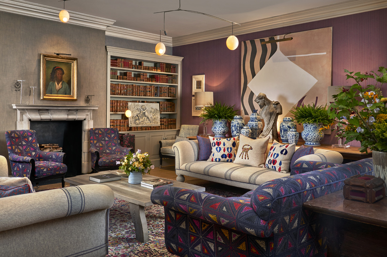 A diagonal shot of the Library at Haymarket Hotel