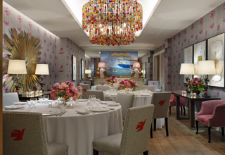 Round dining tables set-up in the Spring private events room at Crosby Street Hotel
