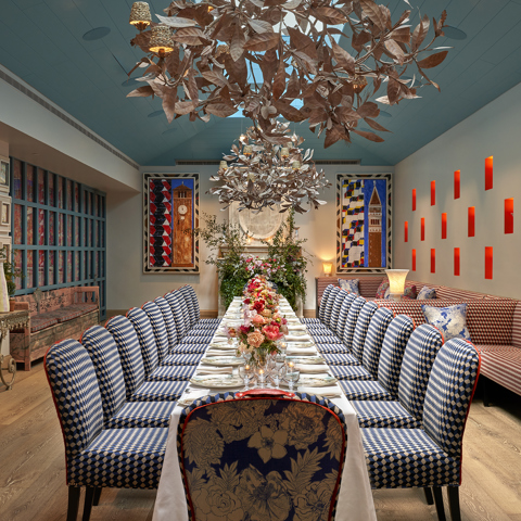 Long dining table set-up in the Orangery private events room at Warren Street Hotel