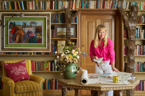 Kit Kemp looks through various fabric and wallpaper samples