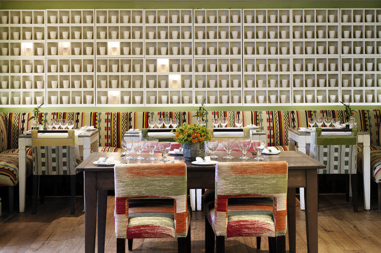 Front shot of the main art wall of the Potting Shed at Dorset Square Hotel