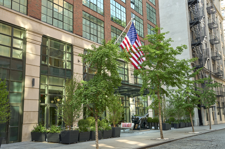 A diagonal shot of the exterior of Crosby Street Hotel